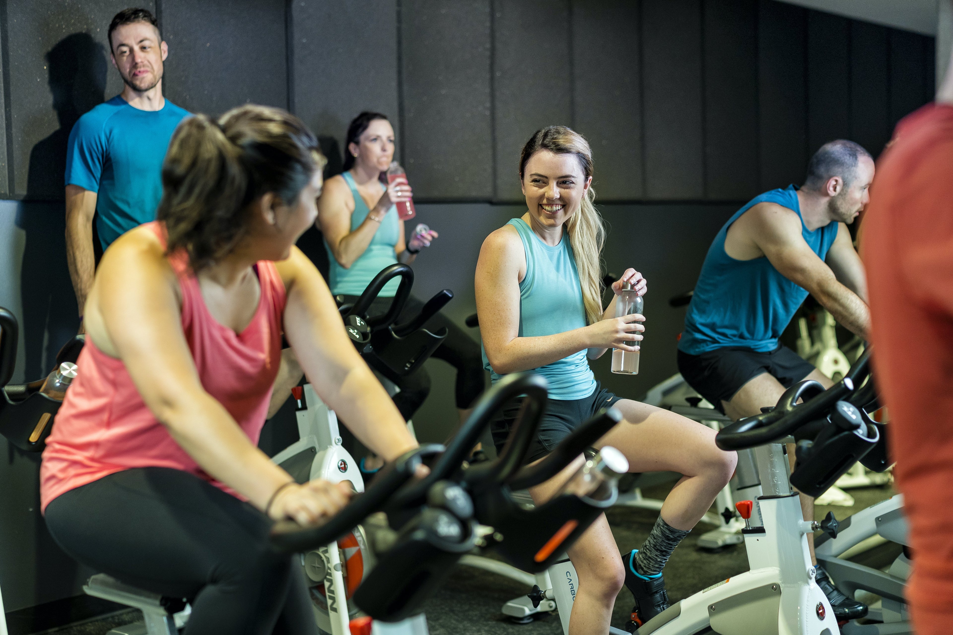 Group of people taking a spin class