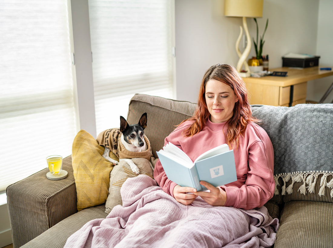 A person relaxing on the couch with Nuun