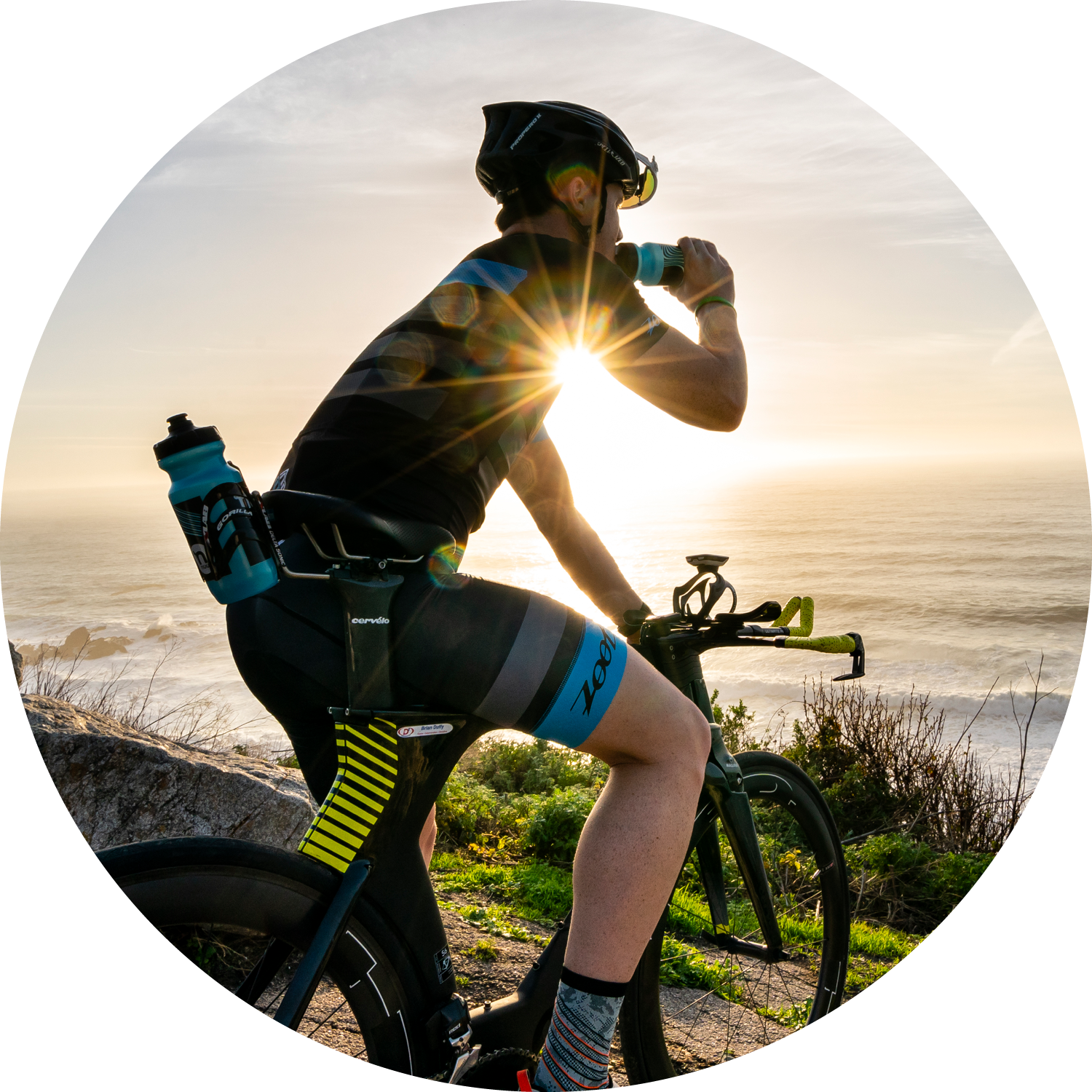 A person drinking Nuun on their bike