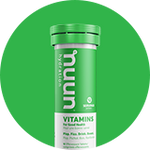 Tube of Nuun Vitamins against a green background